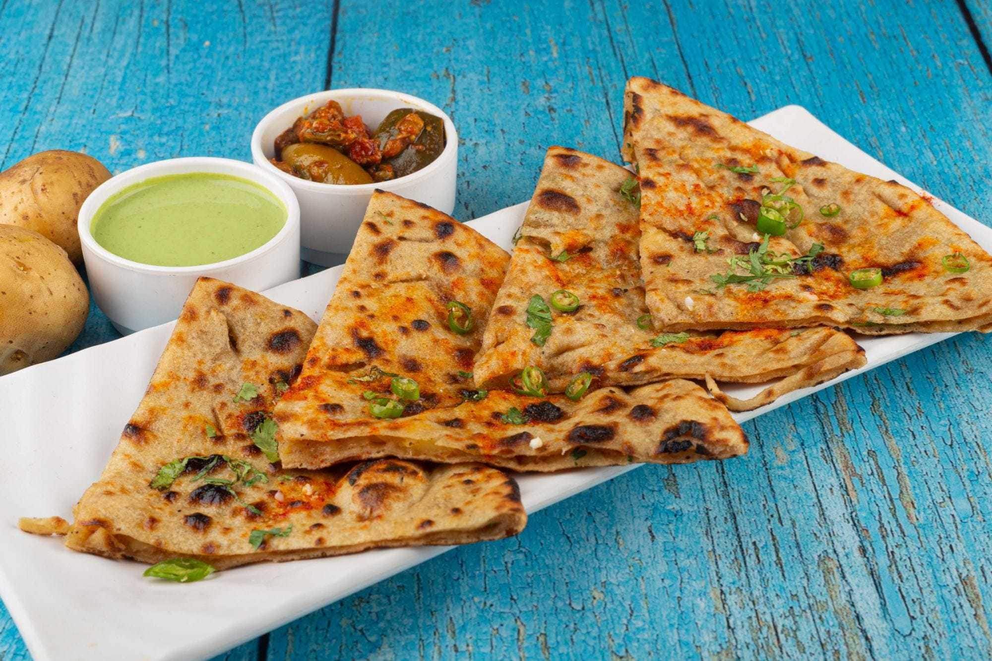 Paratha (Aloo/Gobi/Pudina/Peas/Paneer)